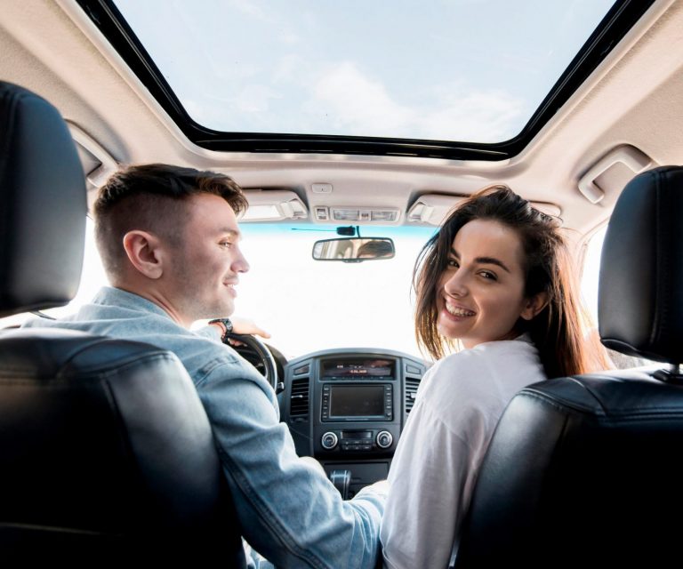 Photo of couple in car illustrates blog: "Collision vs Comprehensive Insurance Coverage: What Is the Difference?"