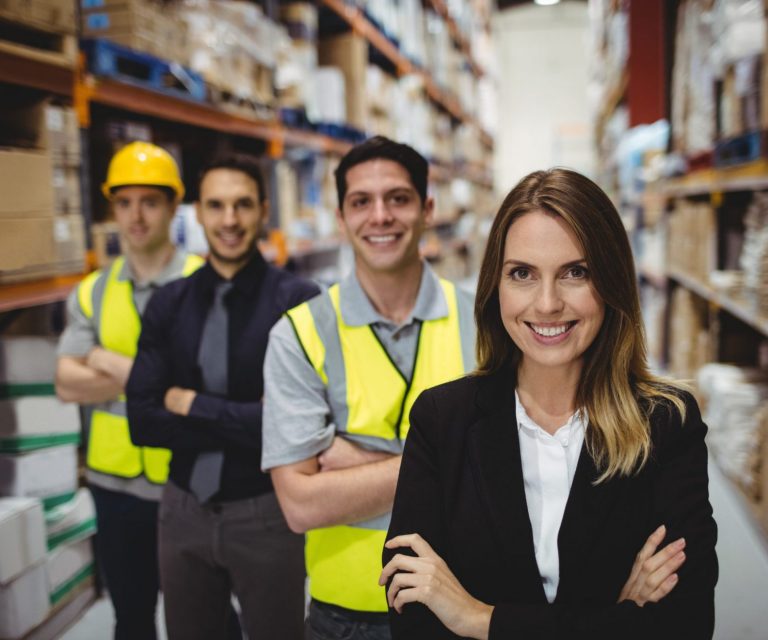 Photo of employees illustrates blog: "Workers Compensation Insurance in California: What You Need to Know"