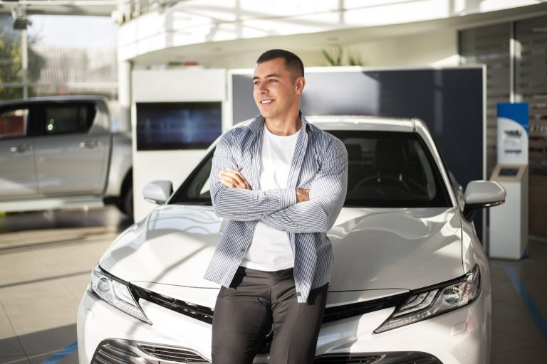 man-car-2-fp Man leaning against car illustrates blog "Auto Insurance: Is California a No-Fault State?"